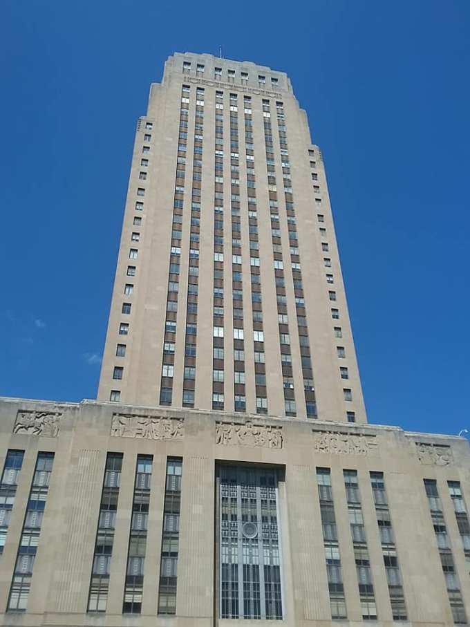 The building was designed in the art deco style that was popular in the 1930s. The building interior is also lovely with a lot of brass fixtures and panoramic friezes.