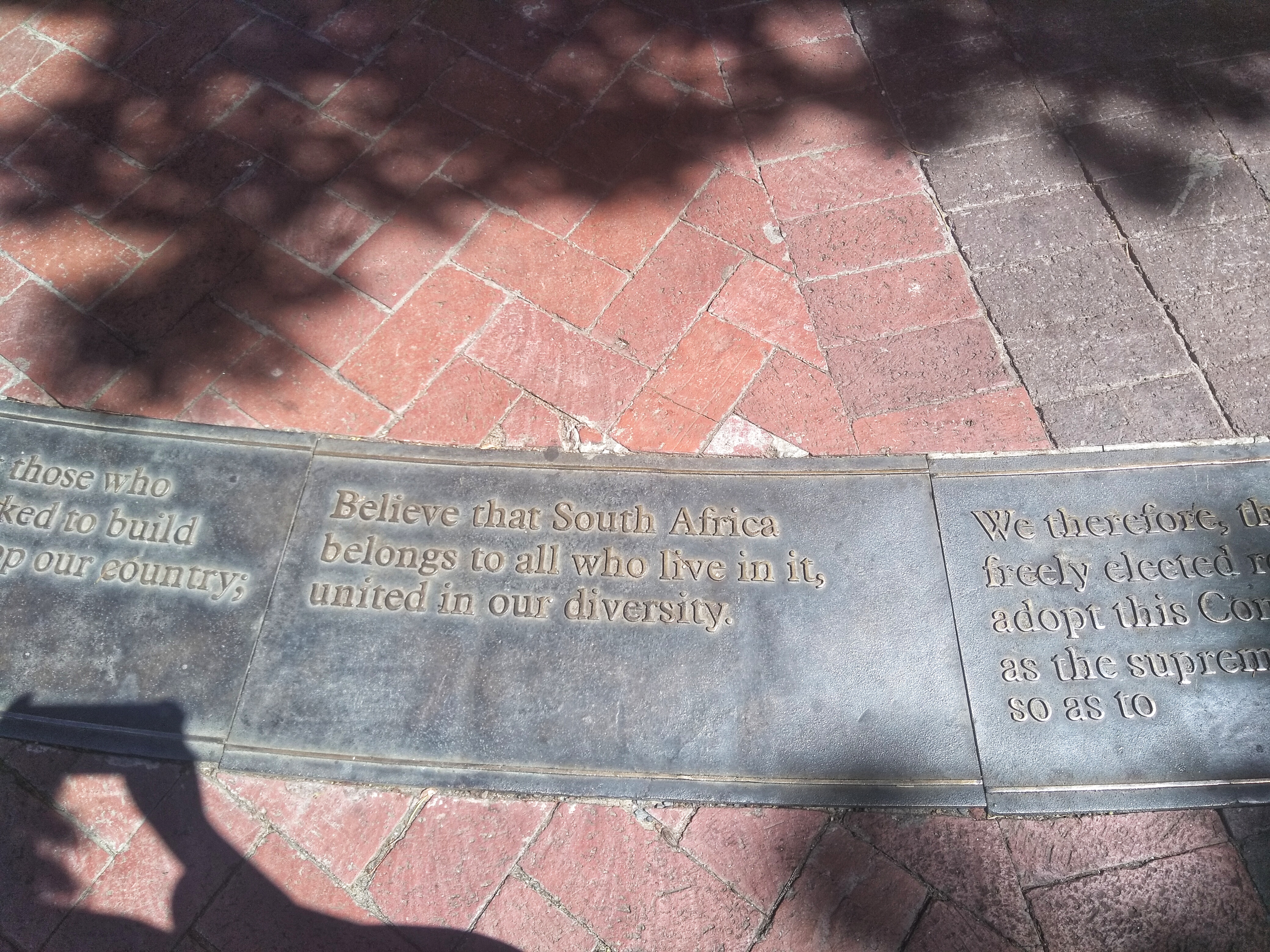 In front of the Company Gardens of Cape Town are the opening lines of South Africa's Constitution